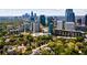 The aerial view shows a cityscape blending residential areas with a skyline at 145 15Th Ne St # 1430, Atlanta, GA 30309