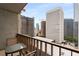 Balcony view of skyscrapers, with outdoor seating and a view of a city under construction at 145 15Th Ne St # 1430, Atlanta, GA 30309
