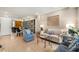 Living room features hardwood floors, a bookshelf, and stylish furniture at 145 15Th Ne St # 1430, Atlanta, GA 30309