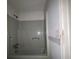 Bathroom featuring a shower and bathtub at 2369 Christian Cir, Covington, GA 30016