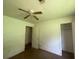 Bedroom with a ceiling fan and closet at 2369 Christian Cir, Covington, GA 30016