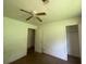 View of bedroom with ceiling fan and closet at 2369 Christian Cir, Covington, GA 30016