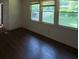 Hardwood floors and natural light from the windows are a plus for this living space at 2369 Christian Cir, Covington, GA 30016