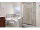 Bathroom features a separate shower and tub with a large window providing natural light at 305 Hidden Creek Ln, Canton, GA 30114