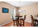 Charming breakfast nook featuring a round table and bar stools, perfect for casual dining at 305 Hidden Creek Ln, Canton, GA 30114