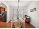 Bright dining room with a modern light fixture and stylish decor at 305 Hidden Creek Ln, Canton, GA 30114