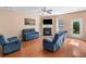 Relaxing living room with fireplace and comfortable seating at 305 Hidden Creek Ln, Canton, GA 30114