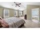 Large main bedroom featuring vaulted ceiling, sitting area, and ensuite bathroom at 305 Hidden Creek Ln, Canton, GA 30114