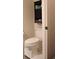 Bathroom featuring white toilet and storage at 405 Mallory Cir, Loganville, GA 30052