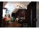Large bedroom with a desk and chair, a bookcase and hardwood floors at 405 Mallory Cir, Loganville, GA 30052