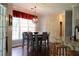 Bright eat-in kitchen featuring granite countertops, stainless steel appliances and dining area at 405 Mallory Cir, Loganville, GA 30052