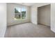 Bright bedroom featuring a window view and closet with shelving, perfect for comfort and organization at 4133 Rosedown Nw Ct, Kennesaw, GA 30144