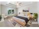 Tranquil main bedroom featuring a tray ceiling, neutral decor and a view to the backyard at 4133 Rosedown Nw Ct, Kennesaw, GA 30144