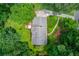 Aerial shot of home showcasing the roof, driveway, and surrounding landscaping at 2291 Smokehouse Path, Lawrenceville, GA 30044