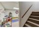 Versatile basement area featuring carpeted stairs and an open space for storage or recreation at 2291 Smokehouse Path, Lawrenceville, GA 30044