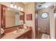 Bathroom vanity, large mirror, and patterned tile floor at 2291 Smokehouse Path, Lawrenceville, GA 30044