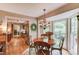 Cozy breakfast nook with bay window offers a picturesque view of the outdoors at 2291 Smokehouse Path, Lawrenceville, GA 30044