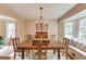 Traditional dining room features a bay window seating area, ideal for Gathering meals at 2291 Smokehouse Path, Lawrenceville, GA 30044