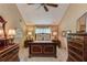 Luxurious main bedroom with high ceilings, beautiful furniture, and large window at 2291 Smokehouse Path, Lawrenceville, GA 30044