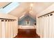Cozy finished attic featuring skylights, a window, and built in platform bed at 3072 Dale Ne Dr, Atlanta, GA 30305