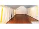 Spacious finished attic featuring hardwood floors and bright curtains at 3072 Dale Ne Dr, Atlanta, GA 30305