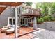 Outdoor backyard deck features wood patio and a balcony extending from the second floor at 3072 Dale Ne Dr, Atlanta, GA 30305