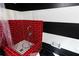 Dog washing station with red tile, handheld shower, and black and white accents at 3072 Dale Ne Dr, Atlanta, GA 30305