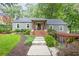 Exterior view with a walkway leading to the front entrance and attached covered parking at 3072 Dale Ne Dr, Atlanta, GA 30305