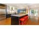 Spacious kitchen with a center island, modern appliances, and an open floor plan at 3072 Dale Ne Dr, Atlanta, GA 30305