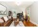 Relaxing living room with hardwood floors, a comfortable couch, and stylish decor at 3072 Dale Ne Dr, Atlanta, GA 30305