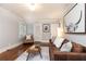 Living room featuring hardwood floors, an accent rug, and cozy seating at 3072 Dale Ne Dr, Atlanta, GA 30305
