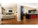 Open-concept living and kitchen area with hardwood floors and modern finishes at 3072 Dale Ne Dr, Atlanta, GA 30305