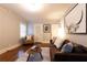 Living room featuring hardwood floors, an accent rug, and cozy seating at 3072 Dale Ne Dr, Atlanta, GA 30305