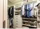 A spacious walk-in closet includes custom shelving and drawers for optimal storage at 3072 Dale Ne Dr, Atlanta, GA 30305