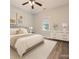 Comfortable bedroom featuring a ceiling fan, light colored walls, and a neutral color palette at 7880 Rivertown Rd, Fairburn, GA 30213