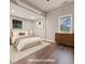 Comfortable bedroom featuring a ceiling fan, light colored walls, and a neutral color palette at 7880 Rivertown Rd, Fairburn, GA 30213