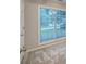 Bedroom featuring large window and plush carpet at 2105 Huntington Hills Trce, Buford, GA 30519