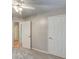 Carpeted bedroom with access to hallway and closet at 2105 Huntington Hills Trce, Buford, GA 30519