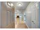 Bright living room with hardwood floors, a cozy fireplace, and plenty of natural light at 2105 Huntington Hills Trce, Buford, GA 30519