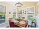 Cozy breakfast nook featuring a rustic table and chairs, ample natural light, and charming decor at 4365 Mantle Ridge Dr, Cumming, GA 30041