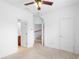 Bedroom featuring neutral carpet, ceiling fan, and white trim at 4874 Seldon Se Way, Smyrna, GA 30080