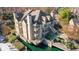 Charming three-story lakefront condo with multiple balconies and private lake access at 504 Mill Pond Ct, Smyrna, GA 30082