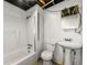 Cozy basement bathroom with a shower, toilet, and sink with mirror cabinet at 1649 Nw Ezra Church Nw Dr, Atlanta, GA 30314