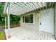 Cozy front porch with a white pergola, perfect for relaxing and enjoying the peaceful surroundings at 1649 Nw Ezra Church Nw Dr, Atlanta, GA 30314