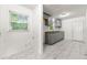 Efficient kitchen with gray cabinets, modern countertops, and updated fixtures at 1649 Nw Ezra Church Nw Dr, Atlanta, GA 30314