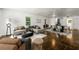 Stylishly decorated living room with ample seating, modern decor, and gleaming hardwood floors at 1649 Nw Ezra Church Nw Dr, Atlanta, GA 30314