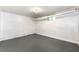Basement room with painted concrete flooring and a small window at 1649 Nw Ezra Church Nw Dr, Atlanta, GA 30314