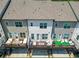 Overhead shot of back porches featuring outdoor seating areas and well-maintained lawns at 20057 Windalier Way, Roswell, GA 30076