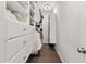 Walk-in closet with shelving and drawers for ample storage space at 20057 Windalier Way, Roswell, GA 30076