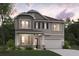 Two-story home showcasing stone accents, neutral siding, a covered porch, and attached two car garage at 2655 Mourning Dove Dr (Lot 50), Grayson, GA 30017